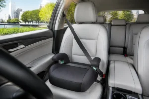 peut on mettre un rehausseur à l'avant d'une voiture